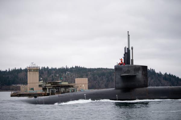 The Ohio-class ballistic missile submarine USS Kentucky (SSBN 737) transits the Hood Canal as the boat returns to homeport at Naval ba<em></em>se Kitsap-Bangor, Wash. after a scheduled patrol, Dec. 21, 2021. 