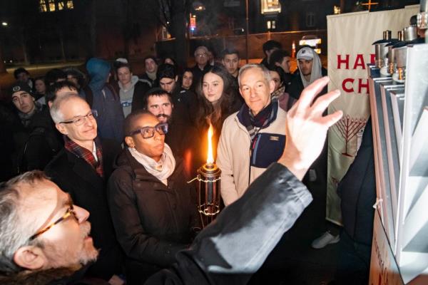 Claudine Gay watches menorah lighting 