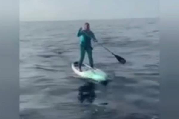 Malea Tribble on her paddleboard.