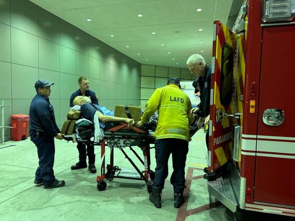 Kareem Abdul-Jabbar gets loaded into an ambulance after breaking his hip in a big fall at a concert.