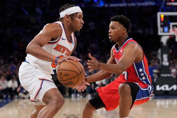 Miles McBride drives on Kyle Lowry during the Knicks' 111-104 Game 1 win over the 76ers.