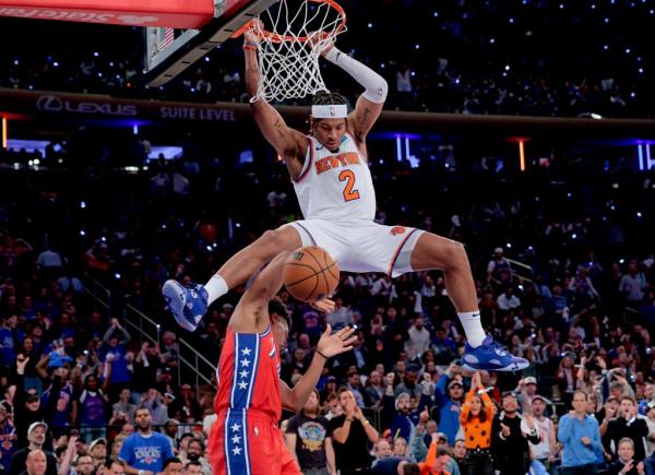 Miles McBride slams home a dunk during the Knicks' victory.