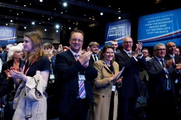 Mandatory Credit: Photo by James Veysey/Shutterstock (14133219bx) Tory delegates give a standing ovation to Kemi Badenoch, Secretary of State for Business and Trade, after delivering her speech at co<em></em>nference Co<em></em>nservative Party Conference, Day 2, Manchester, UK - 02 Oct 2023