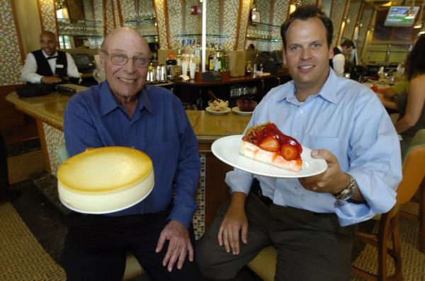 Rosen with his father Walter Rosen inside the Junior's Times Square location in 2006.