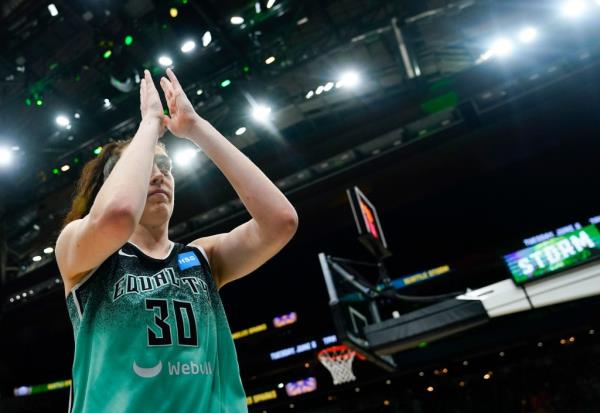 Breanna Stewart claps after a game.