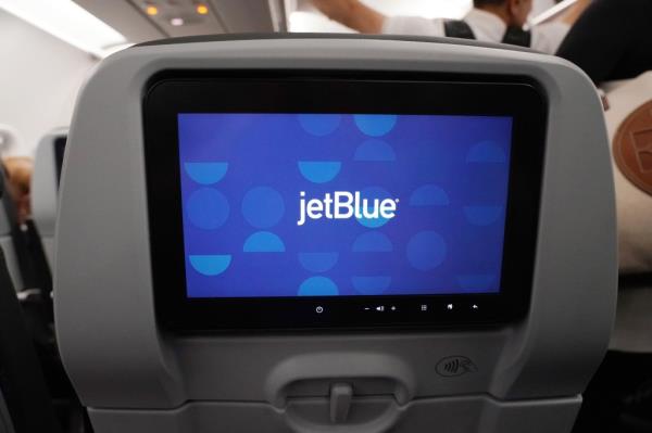 JetBlue sign on airplane seat