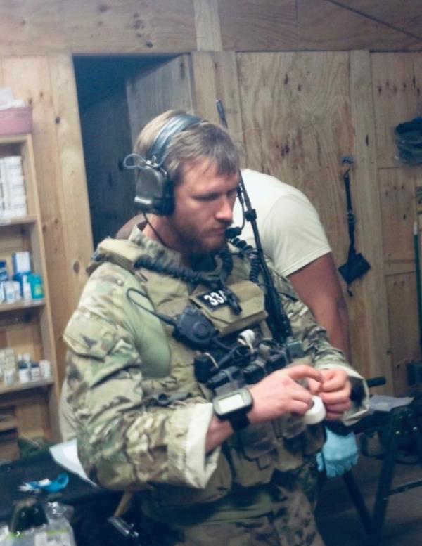 John Paluska prepares for a joint operation between Green Berets and ANASOC forces during his deployment to Ghazni province in 2013.