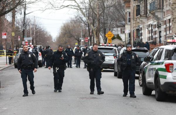 NYPD officers at the scene of wher<em></em>e a teen was shot in the Bronx on March 7, 2024.