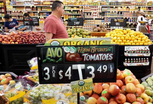 People shopping in the produce section of a grocery store in Los Angeles, California, anticipating the release of the Co<em></em>nsumer Price Index report