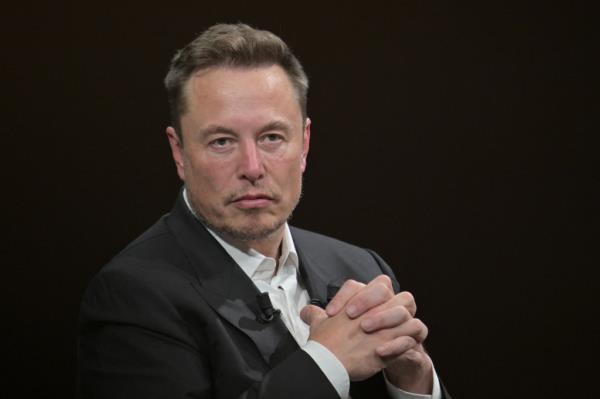 SpaceX, Twitter and electric car maker Tesla CEO Elon Musk looks on as he speaks during his visit at the Vivatech technology startups and innovation fair at the Porte de Versailles exhibition center in Paris, on June 16, 2023.