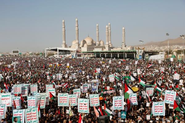 Houthi supporters attend a protest against the United States-led airstrikes.