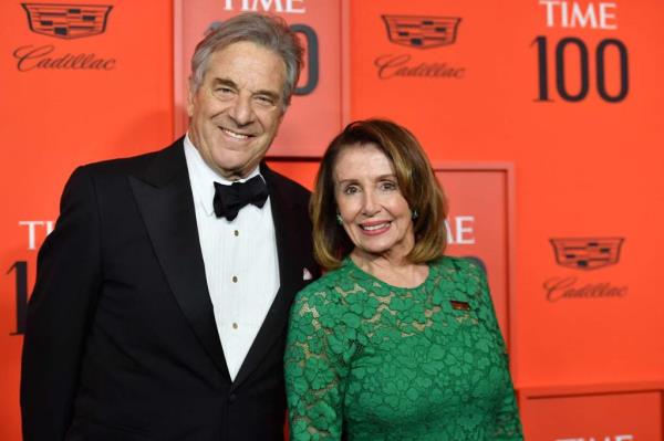 (FILES) In this file photo taken on April 23, 2019, US Speaker of the House of Representatives Nancy Pelosi (R) and husband Paul Pelosi arrive for the Time 100 Gala at Lincoln Center in New York. - New Twitter owner Elon Musk tweeted an anti-LGBT co<em></em>nspiracy theory on October 30, 2022, a<em></em>bout what happened the night US House Speaker Nancy Pelosi's husband was attacked, underscoring co<em></em>ncerns a<em></em>bout the platform's future after he vowed it would not become a 