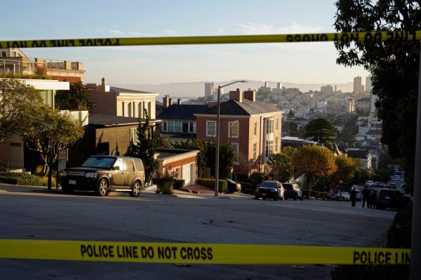 Police tape blocks a street outside the home of House Speaker Nancy Pelosi and her husband Paul Pelosi in San Francisco, Friday, Oct. 28, 2022. Paul Pelosi, was attacked and severely beaten by an assailant with a hammer who broke into their San Francisco home early Friday, according to people familiar with the investigation. 