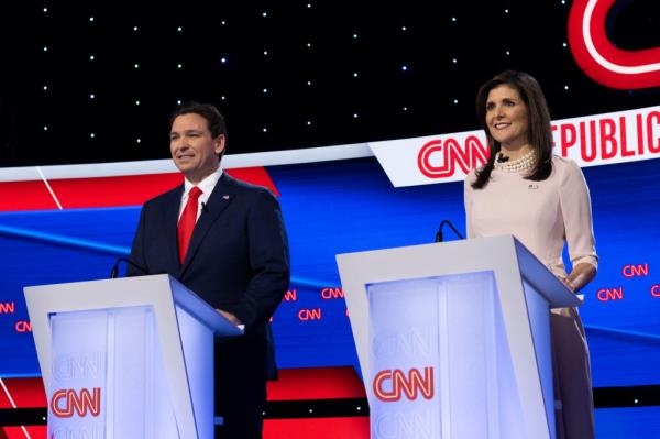 Florida Governor Ron DeSantis (L) and former US Ambassador to the UN Nikki Haley attend the fifth Republican presidential primary debate at Drake University in Des Moines, Iowa, on January 10, 2024.