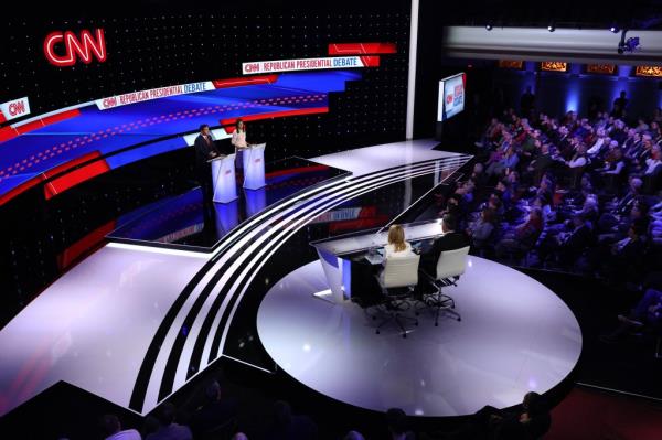 Florida Governor Ron DeSantis speaks as Former U.S. Ambassador to the United Nations Nikki Haley listens as they participate in the Republican candidates' presidential debate hosted by CNN at Drake University in Des Moines, Iowa.