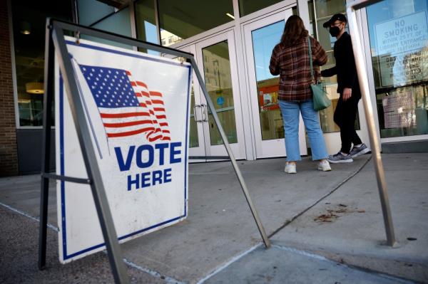 Voters arrive to cast their absentee ballots at the Madison Central Public Library on the last day of early voting on November 06, 2022 in Milwaukee, Wisconsin. 