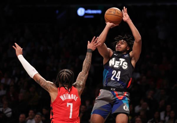 Cam Thomas, shooting a jumper during the Nets' win over the Rockets, said he and his Nets teammates aren't engaging in any trade deadline talk.