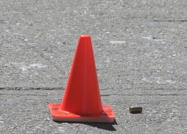 Showing a Con and a Bulletshell, wher<em></em>e there are 7 Bullets on the Street, after two females wher<em></em>e shot at 512 East 138th Street in the Bronx, NY