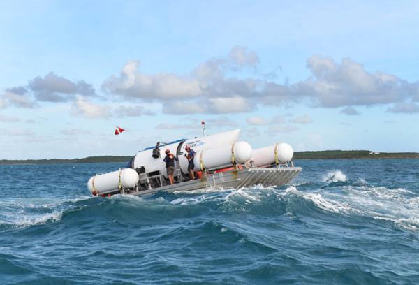 Titan and crew undergoing through rough sea state enroute to dive location. 