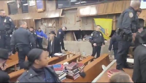 A riot broke out at a Brooklyn synagogue Mo<em></em>nday when cops tried to hold back a group of Orthodox Jewish men who were pushing their way into an illegal tunnel they built.