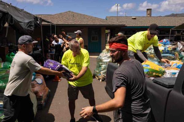 A week after a blaze tore through historic Lahaina, many survivors started moving into hundreds of hotel rooms set aside for displaced locals, while do<em></em>nations of food, ice, water and other essentials poured in.