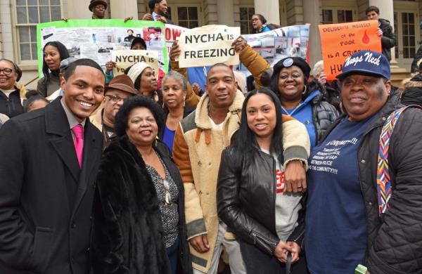 Left to right:  Councilman Ritchie Torres, Carmen Quino<em></em>nes (president of the Douglass Houses tenant association), Ja Rule, his wife Aisha and Mo<em></em>nique Johnson