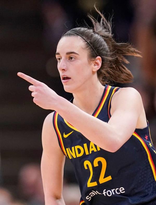 Indiana Fever guard Caitlin Clark (22) reacts to scoring three points Thursday, May 9, 2024, during the preseason game against the Atlanta Dream at Gainbridge Fieldhouse in Indianapolis. 