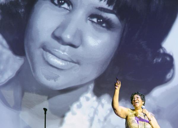 Aretha Franklin performing.