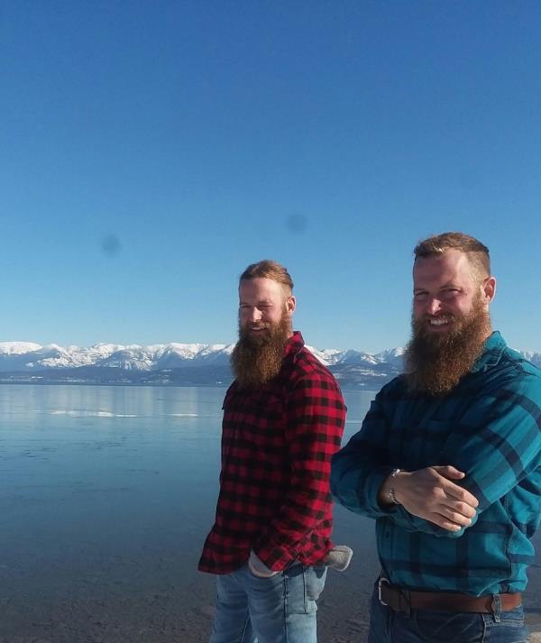 Nick and Andy near the water.