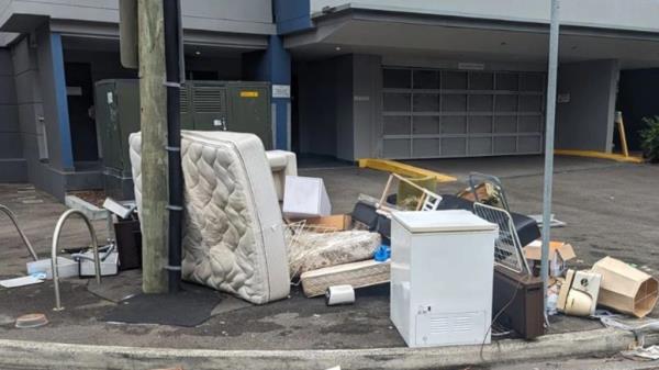 Overflowing trash on street