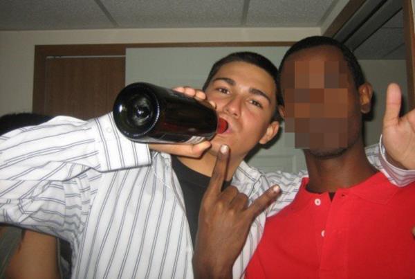 A photo of a younger Matthew Nilo drinking.