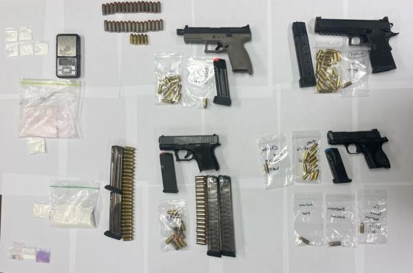 Photo of guns and drugs tweeted by the NYPD Tuesday, April 2, 2024