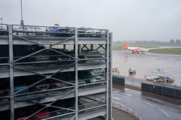 The scene at Luton Airport after a fire ripped through level three of the airport's Terminal Car Park 2, causing it to collapse. The airport, which was closed due to the incident, has since reopened following the fire which caused disruption for tens of thousands of passengers. Picture date: Thursday October 12, 2023. PA Photo. See PA story FIRE Luton. Photo credit should read: Jordan Pettitt/PA Wire