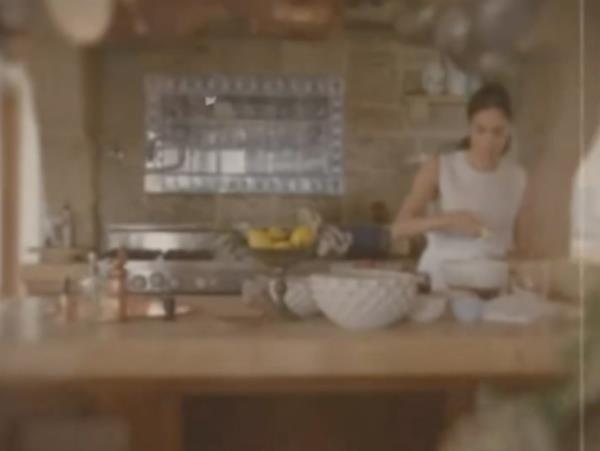 Meghan Markle in a kitchen making something for her new brand, American Riviera Orchard, as seen in an Instagram Story.