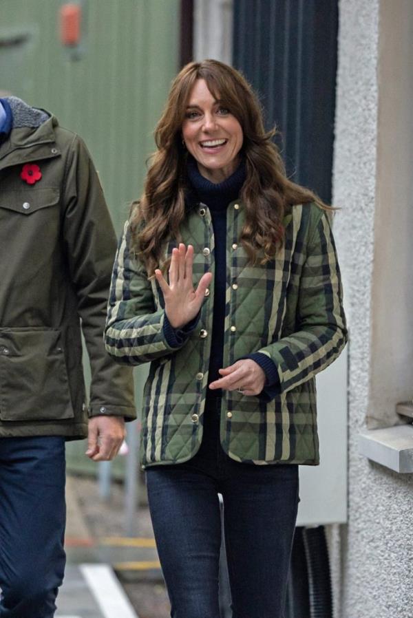 Catherine, the Duchess of Rothesay, waving to the crowd during a visit to DAY1 charity in Inverness, Scotland, wearing a green and black plaid jacket.