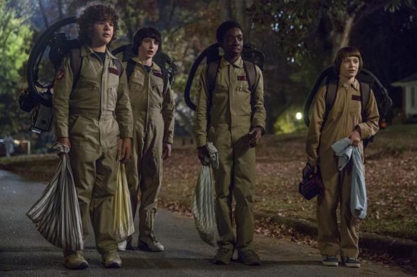 Gaten Matarazzo, Finn Wolfhard, Caleb McLaughlin, and Noah Schnapp dressed as the ghost busters for Halloween in 