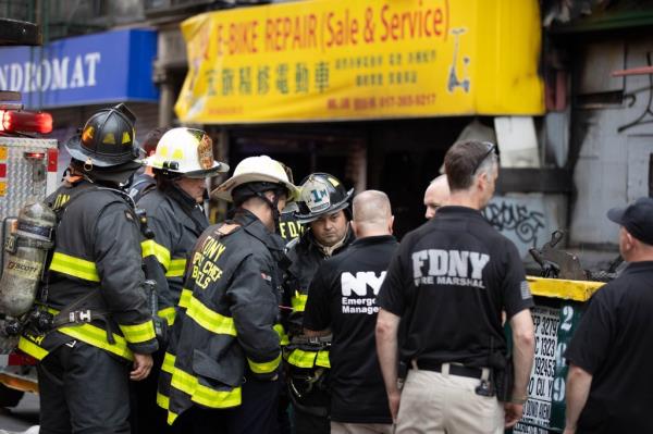 Hazardous Materials Unit firefighters arrive at 80 Madison St. in Manhattan, Friday, June 23, 2023.