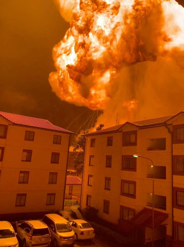 Flames rise following an explosion in the Embakasi district, in Nairobi, Kenya, Friday, in this screen grab taken from a social media video. 