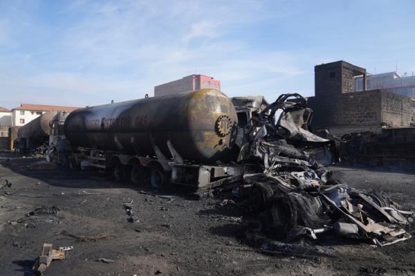 A gas truck is seen burnt out, caused by an explosion at an industrial building in Nairobi, Kenya on Feb. 2, 2024.