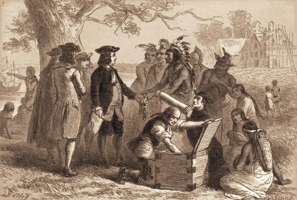 British statesman William Penn (1644 - 1718) (in dark coat) accepts a belt from Tamanend (1628 - 1698), chief of the Lenni-Lenape  Indians, as part of treaty in which Penn purchased a section of land for the Pennsylvania co<em></em>lony, Kensington, Philadelphia, Pennsylvania, 1682. 