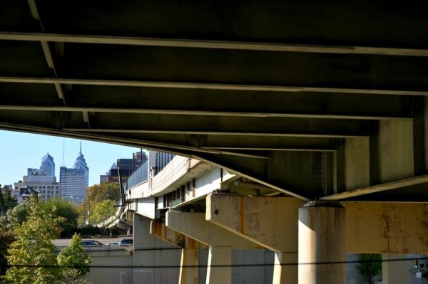 Part of the center City skyline seen from under the Market Street overpass at Penns Landing in Philadelphia, PA.