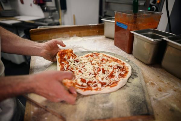 Leo<em></em>nti handmakes a margherita pizza on Monday, April 29.