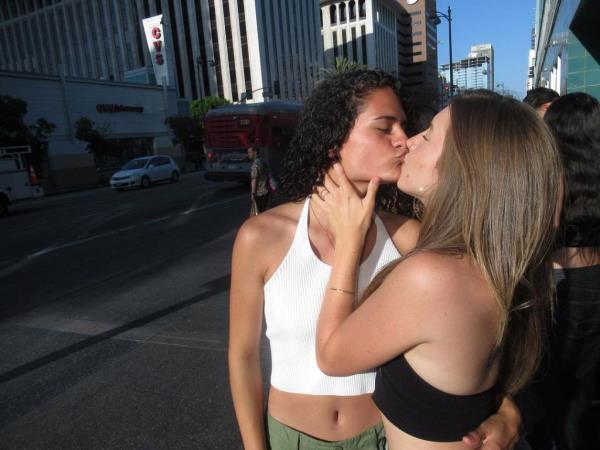 Gianna Valenti also shared a photo of the couple kissing on a sunny street.