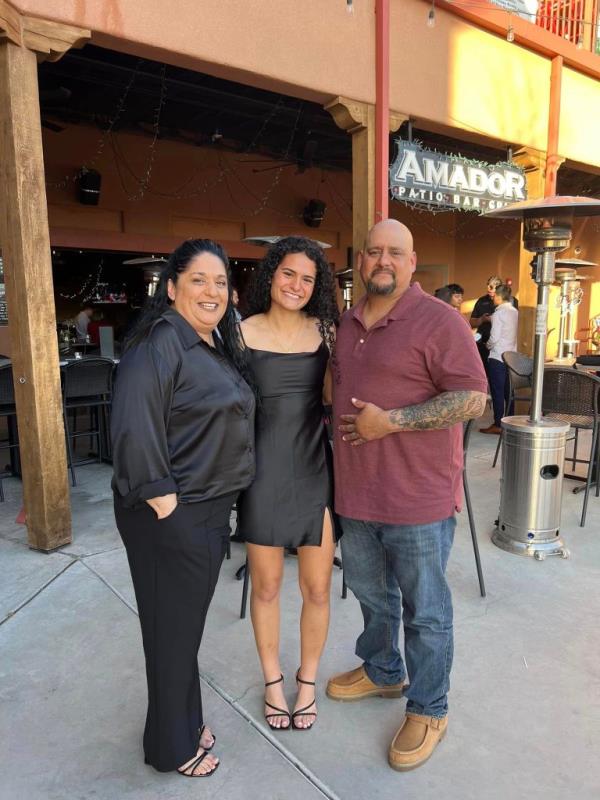 Thalia Chaverria with her parents.