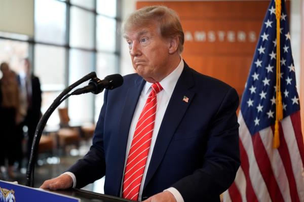 Do<em></em>nald Trump speaks at the Internatio<em></em>nal Brotherhood of Teamsters headquarters as a Republican presidential candidate in Washington DC.