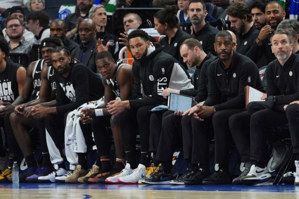 Ben Simmons sits on the bench during the second half of the Nets game against the Timberwolves.