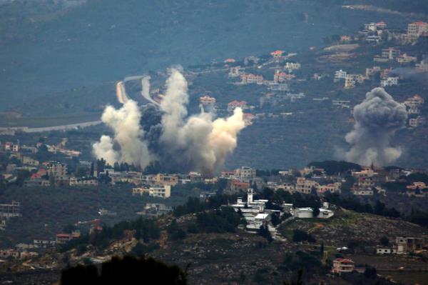 Smoke rises following an Israeli airstrike in Kfar Kila, Lebanon.