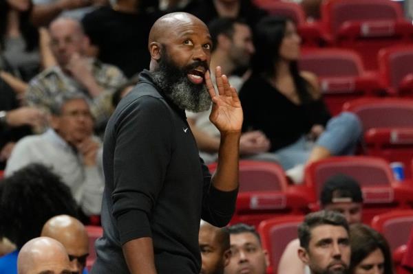 Brooklyn Nets head coach Jacque Vaughn gestures during the first half of an NBA preseason basketball game against the Miami Heat, Wednesday, Oct. 18, 2023, in Miami. 