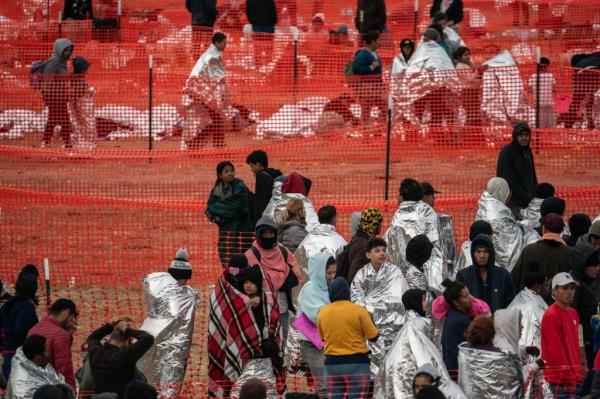 Migrants along the border have had to wear foil blankets for warmth as Border Patrol struggles the manage the surge