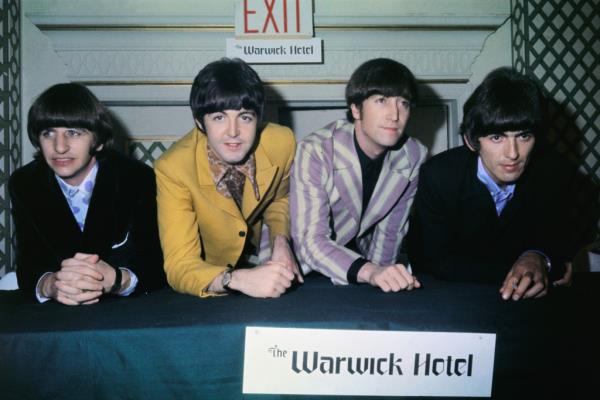 Ringo Starr, (wearing polka dot shirt), Paul McCartney, John Lennon, and George Harrison.